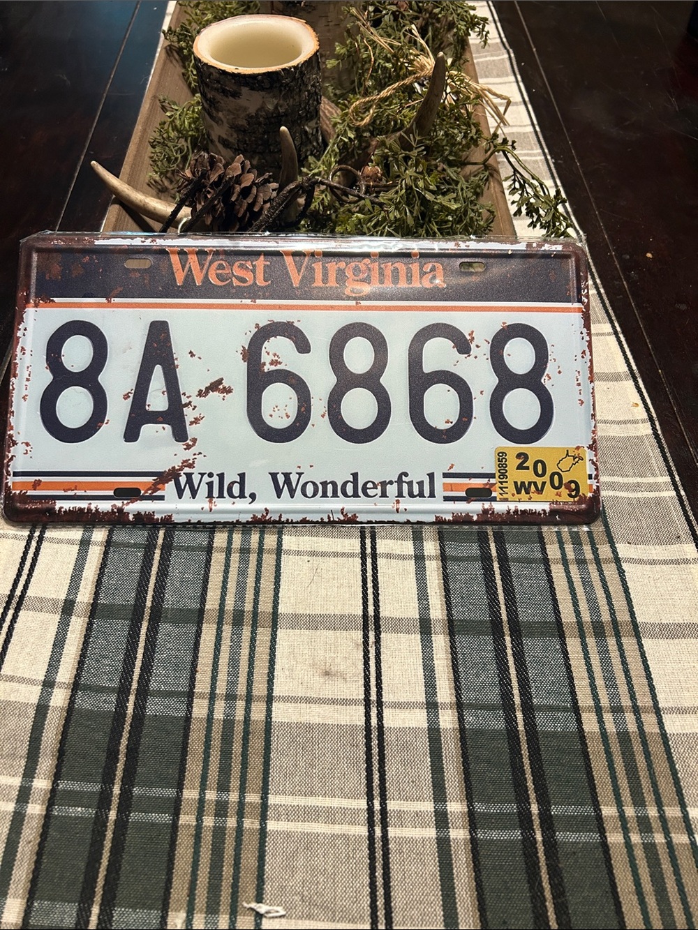 West Virginia Vintage License Plate Sign - White & Black with Rust Accents